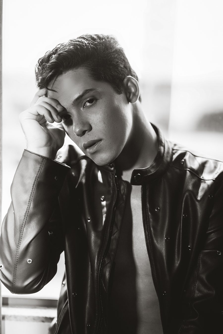 Bruno DiSanto, black and white editorial in a leather jacket