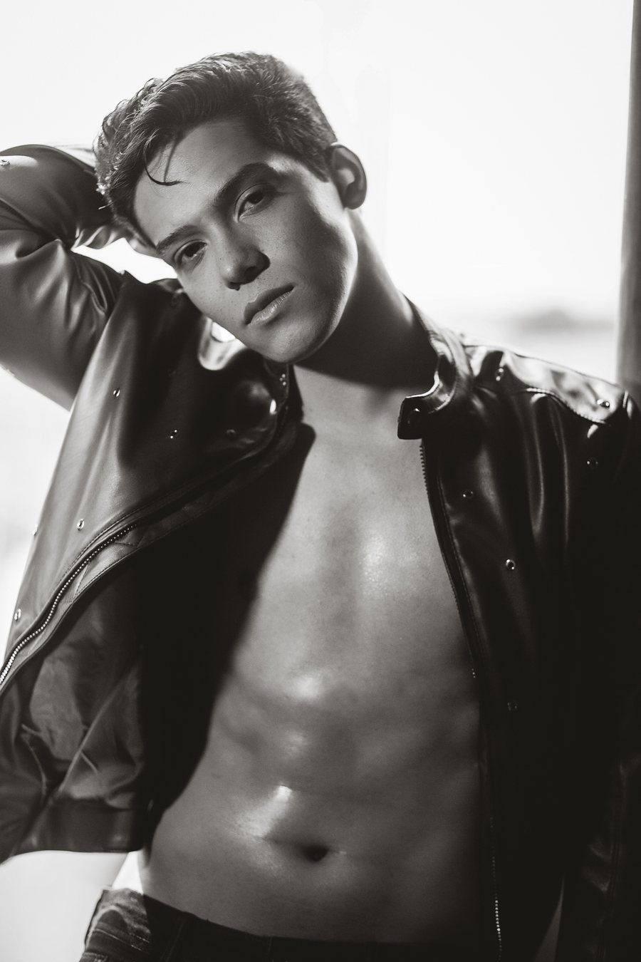 Bruno DiSanto, black and white editorial in a leather jacket
